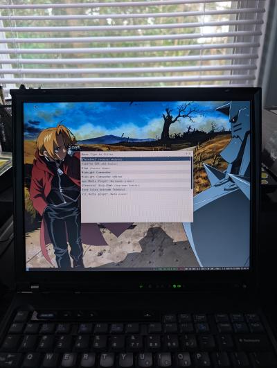 Debian 12 with i3 running on the T41.