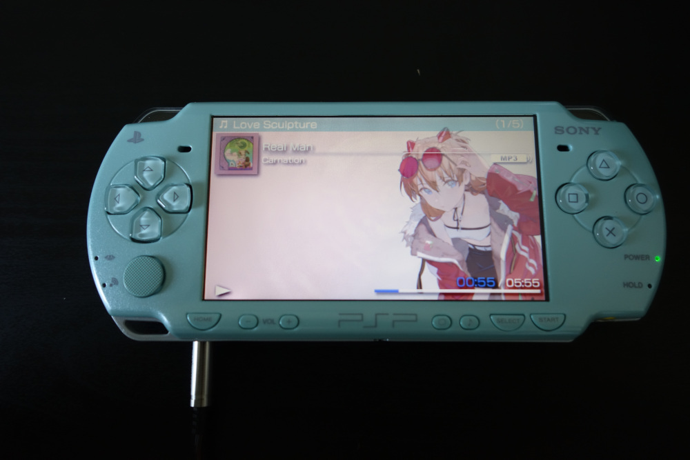 The music player playing Real Man by Carnation on my PSP 2000.