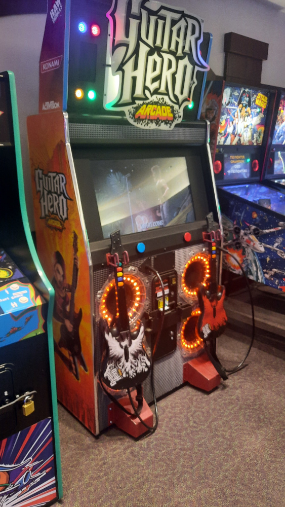 An arcade cabinet of Guitar Hero Arcade.