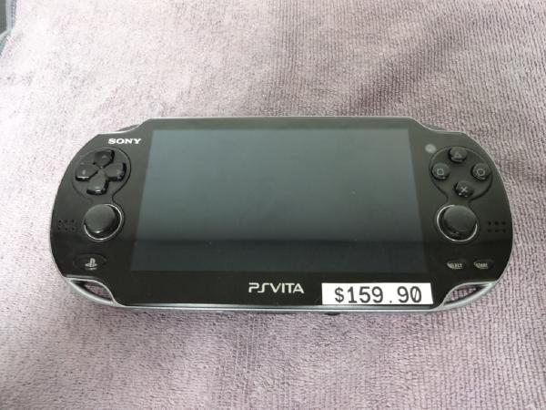 My PS Vita 1100 model, with a sticker that says $159.90